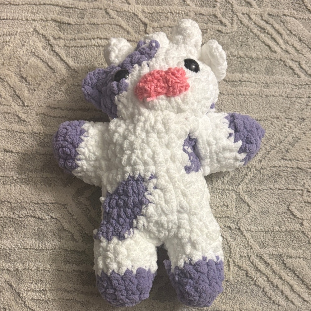 Crocheted handmade Cow Toy with Purple and White Design